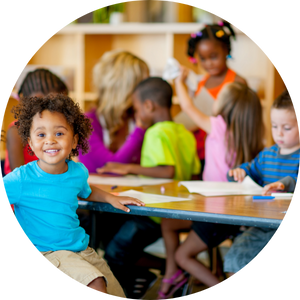 preschool kids working at table